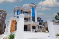 Meizhoudao Poxin Daoju Homestay (Huangjin Shatan) Hotels near Reclining Buddha of the East Sea