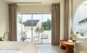 Chunye Design Homestay (Wuzhen Xizha Scenic Area)