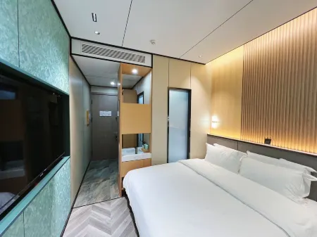 Metropolitan Garden Hotel (South Railway Station Friendly Times Square Branch) Отели рядом с достопримечательностью «Jinghe Ecological Park»