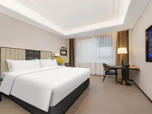 Jinjiang Metropole Hotel (Xinyang Gushi Government Square Branch)