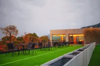 Qiyue Hot Spring Homestay - ที่มีบาร์