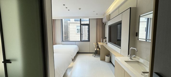 Yi jia shu mian HOTEL Hoteles en Condado de De'an