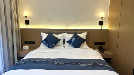 Home Inn Huayi Selected Hotel (Longyan Liancheng Guanzhishan Branch) Отели рядом с достопримечательностью «Jiulong Lake (Jiulong Cave Cluster)»