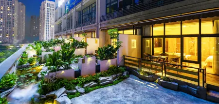 Puju Shuimo Yinshe Hotel Отели рядом с Аэропорт Ваньчжоу