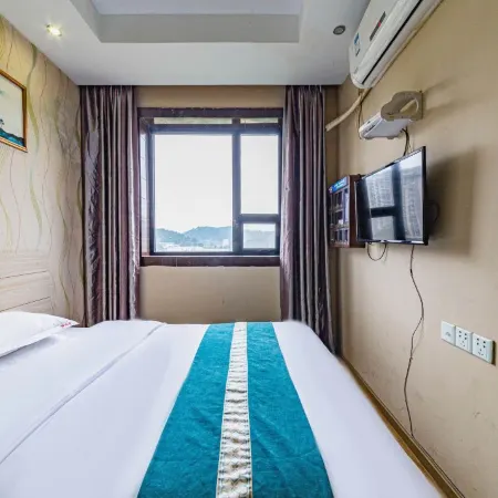 Zhouming Yuxiang Express Hotel (Suining Railway Station)
