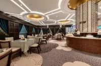 Huancheng Caston Hotel - servizio colazione