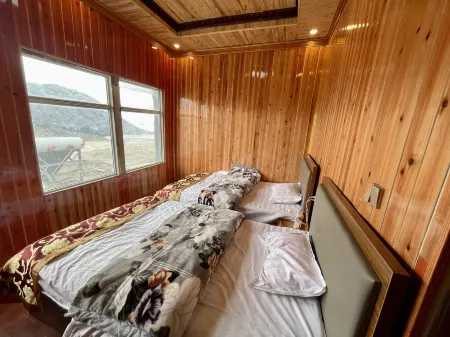 Basu Xiangduo Inn Отели рядом с достопримечательностью «Ranwuzhen»