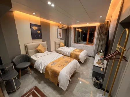 Hegang Yishang Hotel Отели рядом с достопримечательностью «Zhenxing Square»