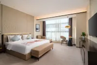 Qingdao Ronghai Yaozhou Hotel Отели рядом с достопримечательностью «Парк Цзиньхуабридж»