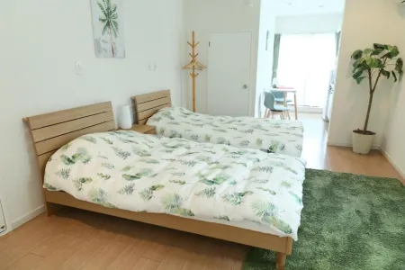 Mk Green Hotel Отели рядом со станцией Minami-hatogaya Railway Station