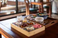 Yulong Qiyunli Designer Homestay - petit déjeuner