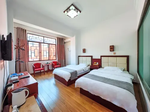 Longling Qiaoyuan Hotel