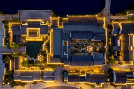 Suqian SCHOLARS BOUTIQUE Hotel (Suzhou Street) Отели рядом с достопримечательностью «Baolong 24Th Street»