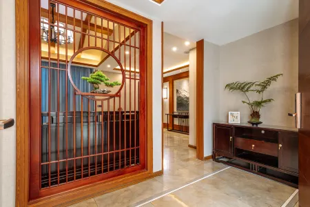 Baoshan qiyuezhuang Hotel (Sanguan Cultural Square) Отели в г. Баошан