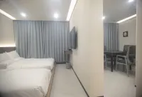 舒美商務賓館 紅海灘國家風景廊道-購物中心附近的飯店