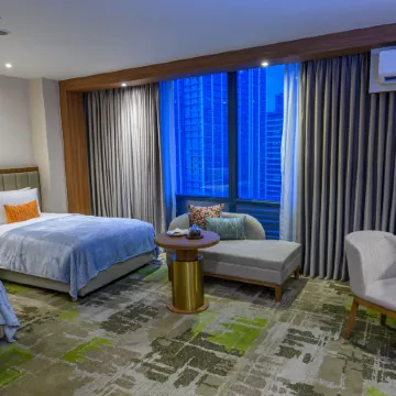 MCollection - Business & Leisure Stay in Eastwood City Отели рядом с достопримечательностью «Павильон для мероприятий Blue Leaf Cosmopolitan»