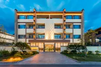 Douzhou Courtyard Hotel (Maoming Xinyi Douzhouli Cultural and Creative Street) Hôtels à : Xinyi