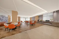 Yunying Baojing Shikong E-Sports Hotel (Hua Wuyue Plaza Huaxing Road) - parking
