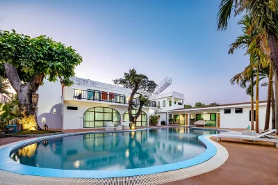 H Flora Hotel Hotels near Kalare Night Bazaar