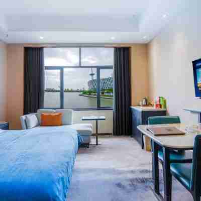 鹽城港府精品酒店（聚龍湖店） Rooms