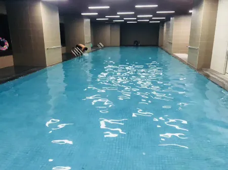 Star Wishes Apartment (Shenzhen Science Park ) Отели рядом с достопримечательностью «Shenzhen University Stadium»