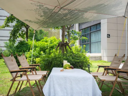 Tang Xia Hua Hotel Отели рядом с достопримечательностью «Dadeng Island»