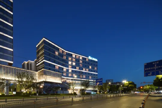 HanTing Hotel (Jiaxing University Nanhu) Отели в г. Цзясин