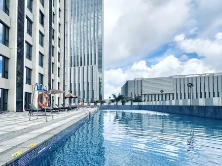 Xin Aolin Hotel (Zhuhai Tangjiawan Station) Отели рядом с достопримечательностью «Zhuhai Branch of Beijing Normal University Dormitory»