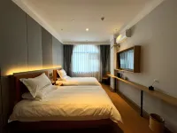 Yiju Fashion Hotel (Minquan Railway Station Shop)