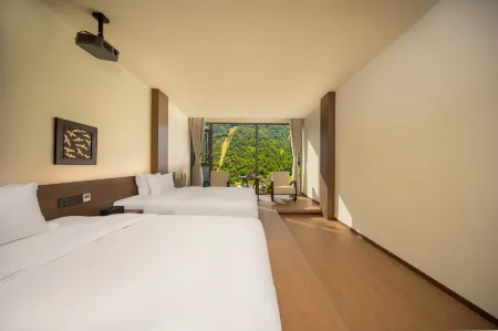 Hailuogou Yunman Warm Resort Hotel Отели рядом с достопримечательностью «Moxi Ancient Town»