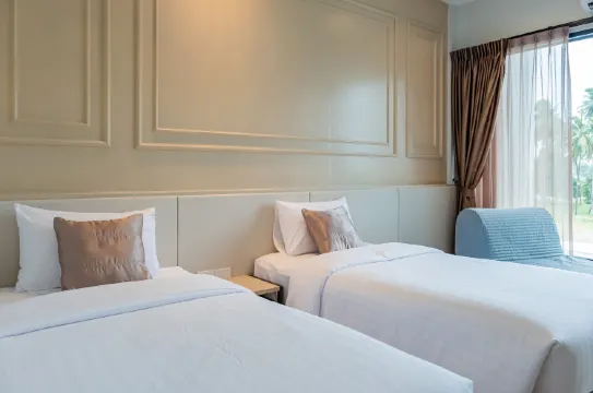 ห้องดีลักซ์เตียงแฝดพร้อมระเบียง