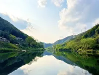 Bamboo Raft Retreat · Xijin Wild Ferry