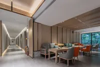 Weijianshan Homestay (Shennongjia Muyuzhen Xiangxi Street Branch) - Quầy bar