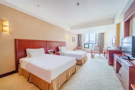 Ramada Plaza by Wyndham Chongqing West Отели рядом с достопримечательностью «Dazu Stone Carving Baoding Mountain Scenic Area - Guiding Service Hall»