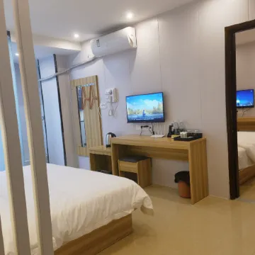 Wankelai Business Hotel (Hechi Jinchengjiang Zhiye Xueyuan)