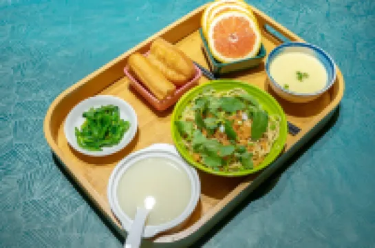 May Boutique Hotel (Xinyang East Railway Station Evergrande Plaza)