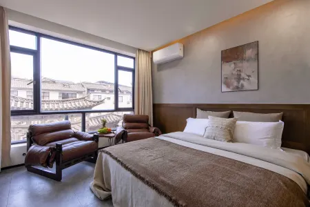 Weishi · Air Qieman Xiangmo Homestay (Dali Ancient City South Gate) Отели рядом с достопримечательностью «Puxian Temple»