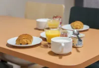 託魯瓦中心B＆B酒店 - 早餐
