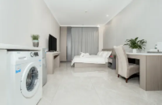 Longkou Jinli Serviced Apartment Hotel (Longhu Tianjie Poly Plaza)