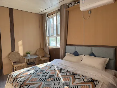 Yining Xinyou She Homestay (Yining Airport Railway Station Store) Hotels near Xinjiang Production and Construction Corps Radio and Television University No.4 Agricultural Division Branch