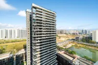Flower Construction • Happy Valley Resort Apartment (Sanya Joy City Store) Hotel di Sanya