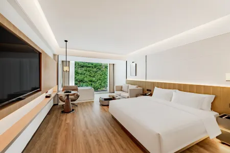 Shitai Qingsi Kangyuan Resort Hotel Отели рядом с достопримечательностью «Peng Lai Xian Dong»