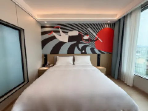 Junyi Chain Hotel (Sanjiang Drum Tower Duoye Plaza)