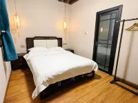 Ban Yin·Silkworm Mulberry Bureau Homestay (Jianchuan Ancient Town Branch) โรงแรมในเจียนฉวน