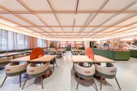 Orange Hotel (Shanghai Qingpu New Town Subway Station Branch) - พร้อมอาหารเช้า