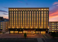 Rezen Huanxi Hotel (Huangchuan Sports Center Branch) - 주차장