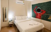 Wisdom Muangthong Hostel - Hostales