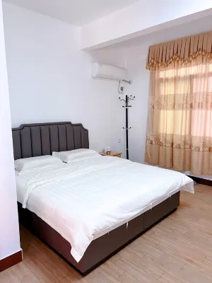 Guihong Hotel Отели рядом с достопримечательностью «Деревня Монхаябу»