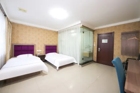 Shell Hotel (Yushu) Отели в г. Юйшу