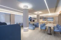 โรงแรม HanTing (ศูนย์เปลี่ยนถ่ายจิ่วหัวซาน) - พร้อมอาหารเช้า